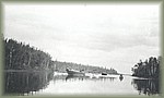 Men travelling in boat.