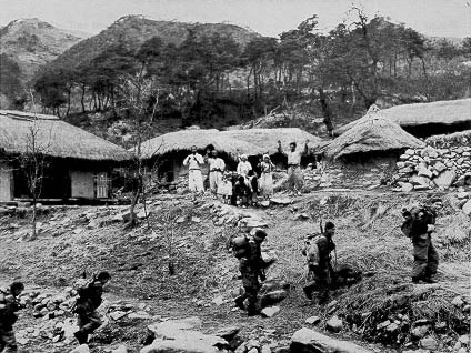 Foot patrol in Korea, 11 March, 1951.