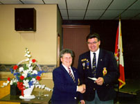 Ladies Auxiliary donating cheque