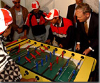 Prime Minister Chrtien playing foozball with Algerian youth in Algiers.