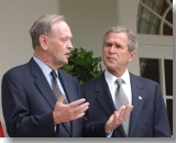 Prime Minister Jean Chrtien and United States President George W. Bush make statements to the media in the Rose Garden at the White House.  Washington, D.C.