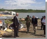 Prime Minister Chrtien visits the Green Acres tornado site with officials (Pine Lake, Alberta)  