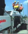 Prime Minister Chrtien on construction equipment during the announcement of the twinning of the Trans Canada Highway in New Brunswick (St. Leonard, August 14, 2002)