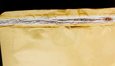 Compressed Seal - photo 2 - Polyester Laminate has Melted Due to Overheating of the Seal