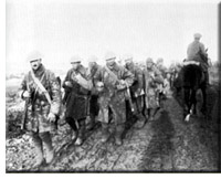 Canadian troops leave the trenches for a rest in the rear in November 1916.