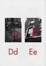 Page from book, THE CITY ABC BOOK, with two photographs, of a bike and a window, and the letters D and E