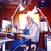 Color photo of Dayal at work in her studio, taken shortly before her death