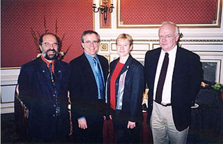 Photo of group, Université Laval: Claude Bonnelly, Library Director and Guy Teasdale, Librarian & Electronic Documents Advisor. University of Calgary: Jackie Bell, Our Roots Project Manager and Frits Pannekoek, Director of Information Resources