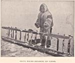Photograph: An Inuk repairing his sledge