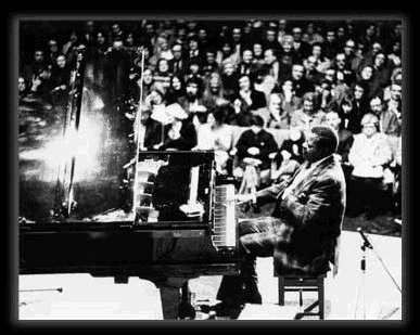 Photo: Oscar Peterson on stage at the Albert Hall, Nottingham.  Thursday 4th March 1976